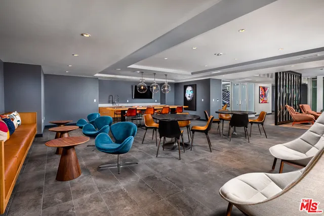 a room with furniture and gym equipment