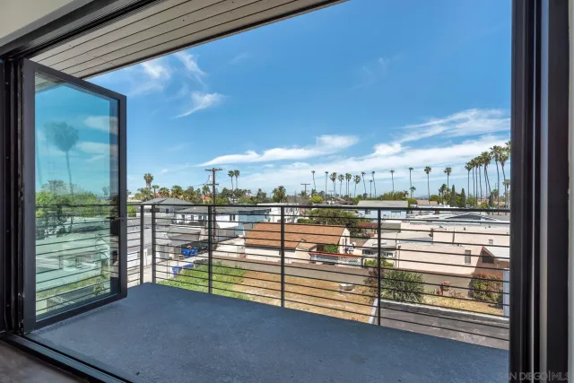 a view of a balcony with city view