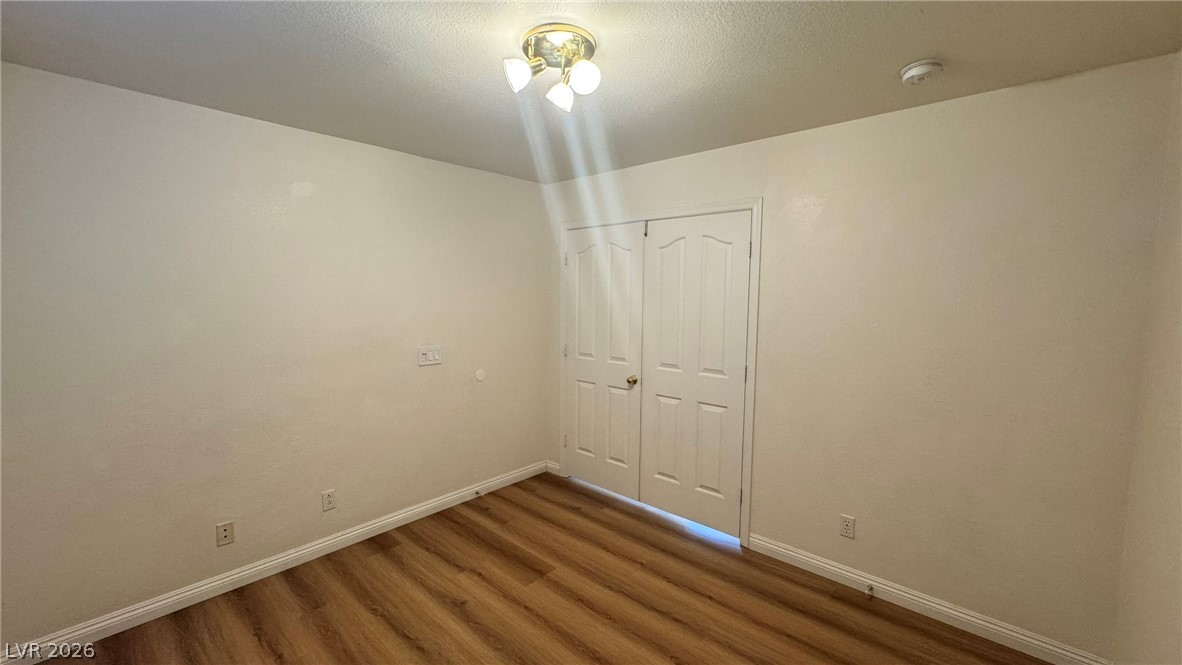 9716 Ridge Creek Place Las Vegas, NV 89134 - Photo 9 of 28 This versatile room features warm flooring and a closet, ready for your personal touch.