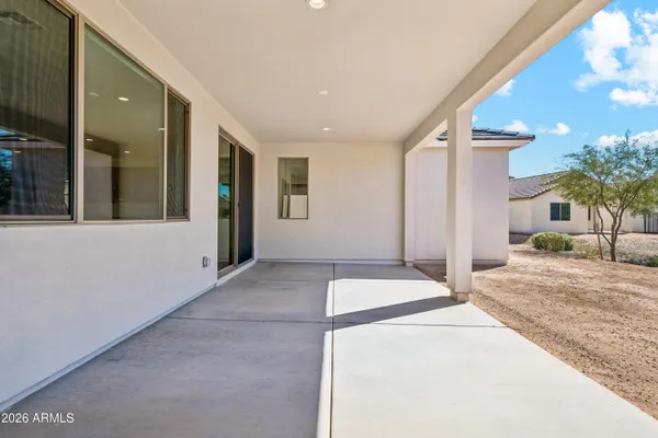 a view of a house with a patio