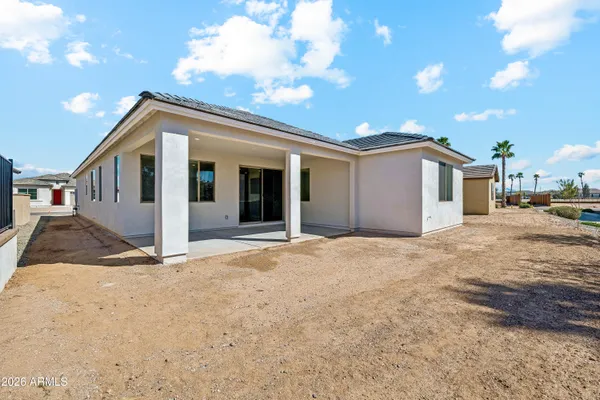 a view of a house with a snow in the yard