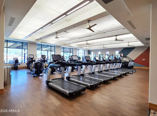 a room with lots of gym equipment