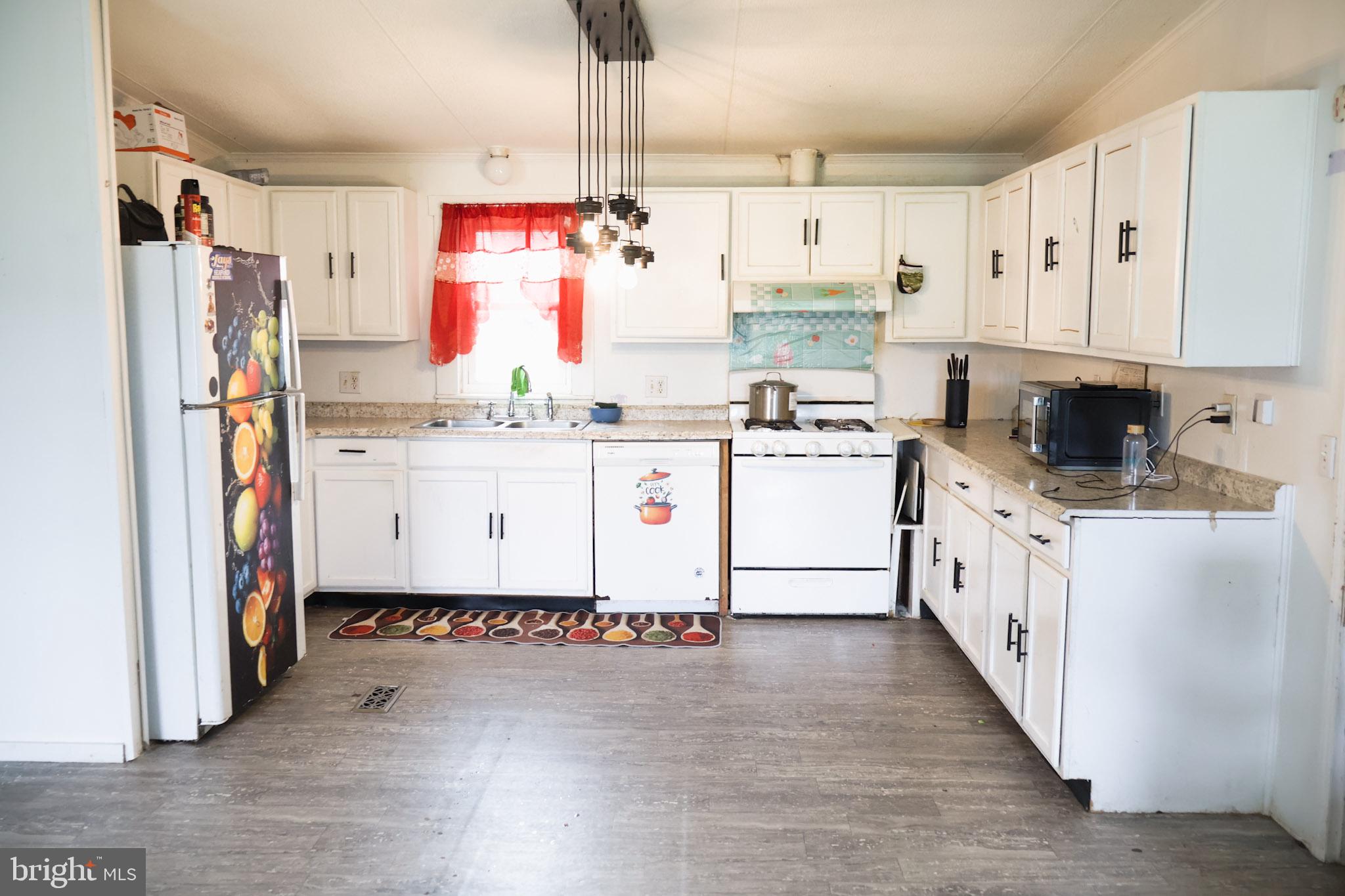 4512 Woodpecker Road Seaford, DE 19973 - Photo 8 of 32 Bright and inviting kitchen space.