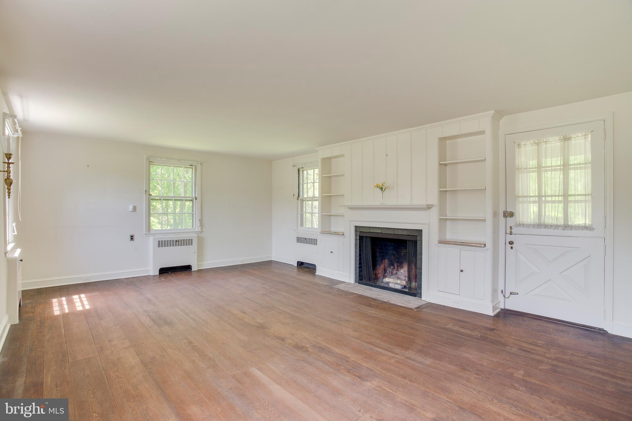 1824 Frederick Road Baltimore, MD 21228 - Photo 18 of 36 Living room with wood floors