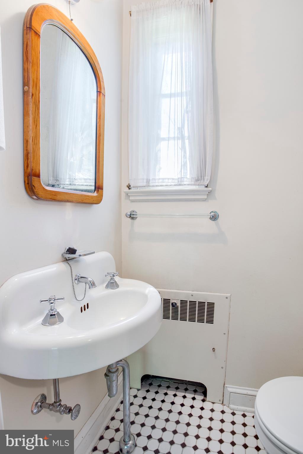 1824 Frederick Road Baltimore, MD 21228 - Photo 22 of 36 First floor half bath