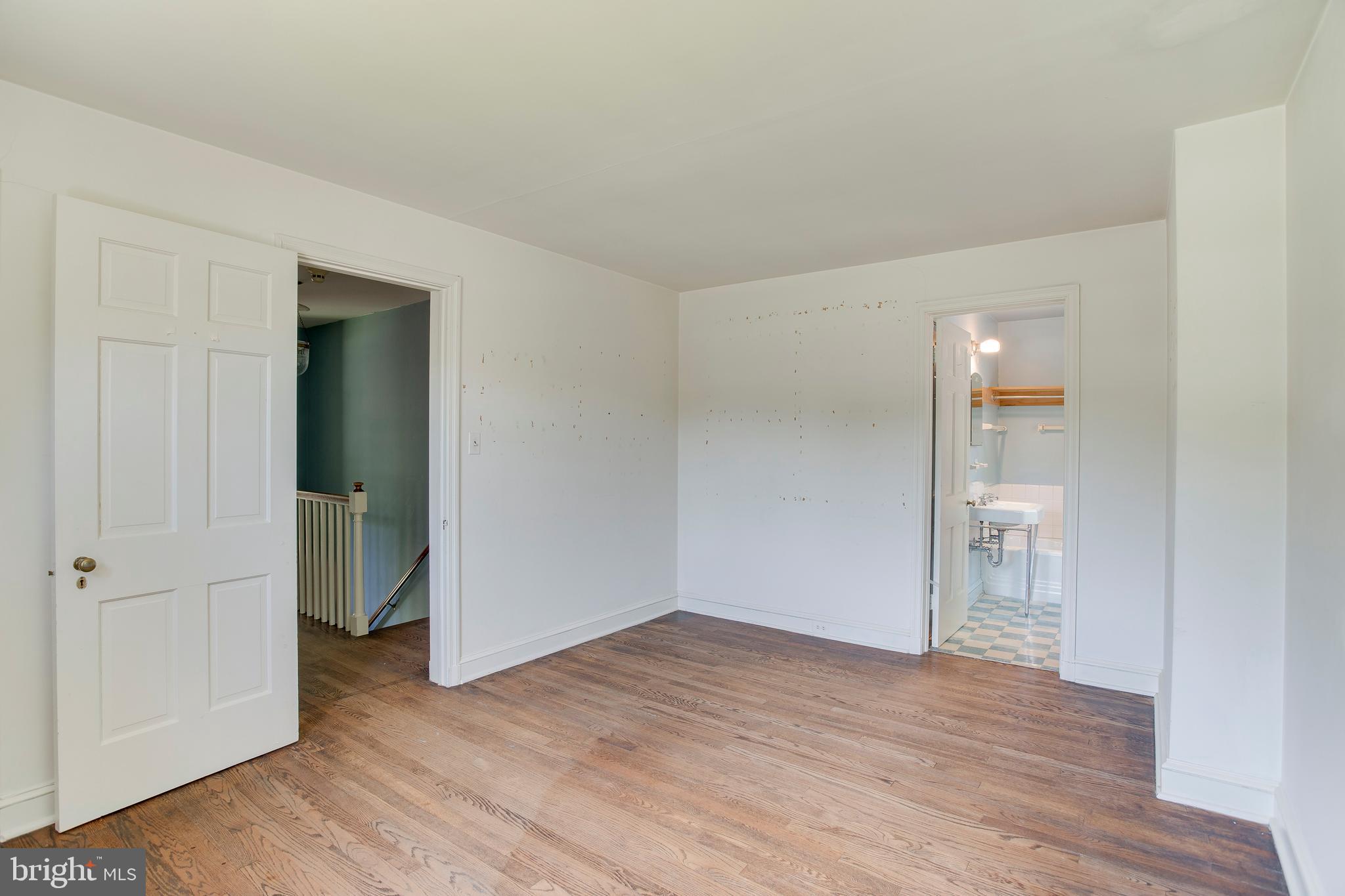 1824 Frederick Road Baltimore, MD 21228 - Photo 28 of 36 Bedroom #2 with shared full bathroom
