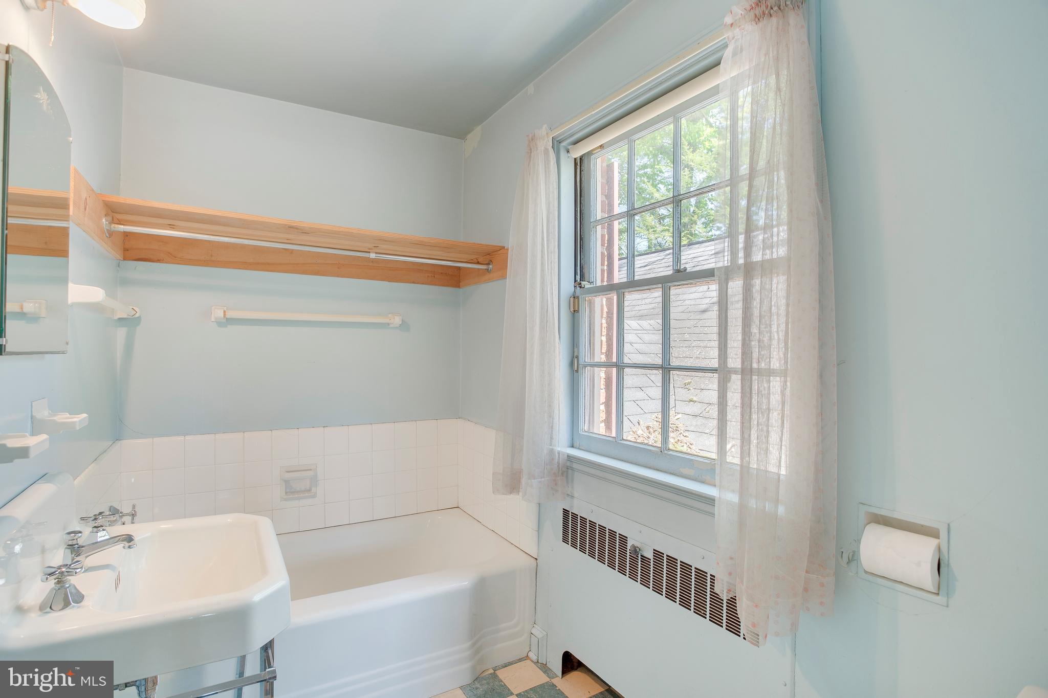 1824 Frederick Road Baltimore, MD 21228 - Photo 30 of 36 Shared bath connected to bedrooms 2 & 3