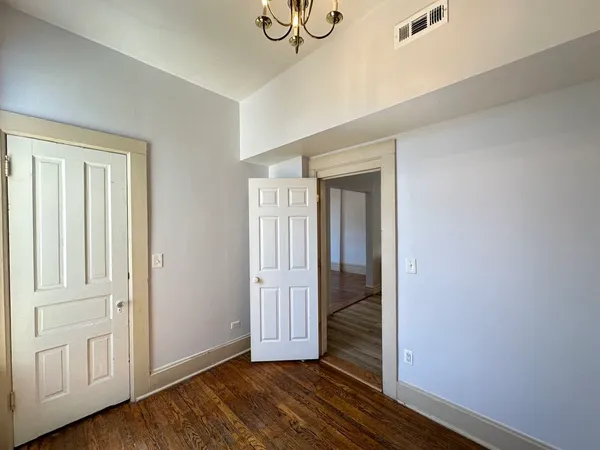 a view of a livingroom with wooden floor