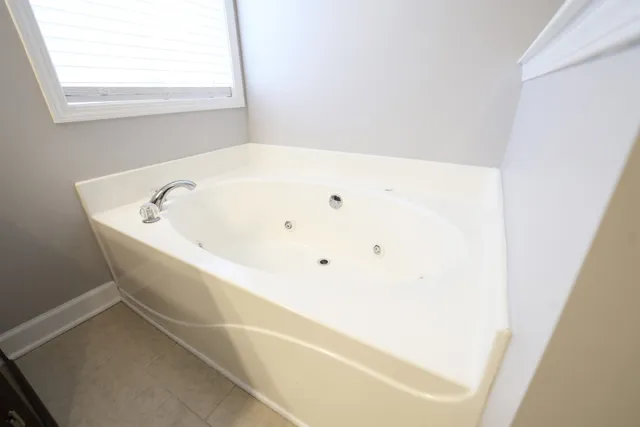 a bathroom with a bathtub