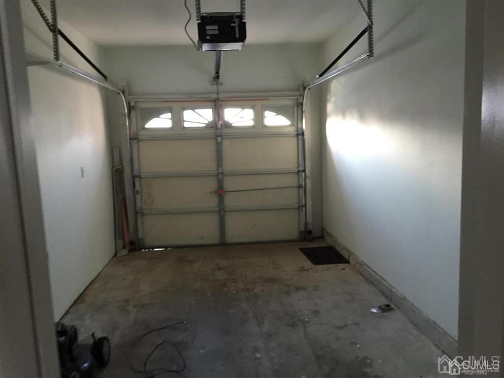 22 North Whittier Street, Unit B Carteret, NJ 07008 - Photo 11 of 27 a view of a garage