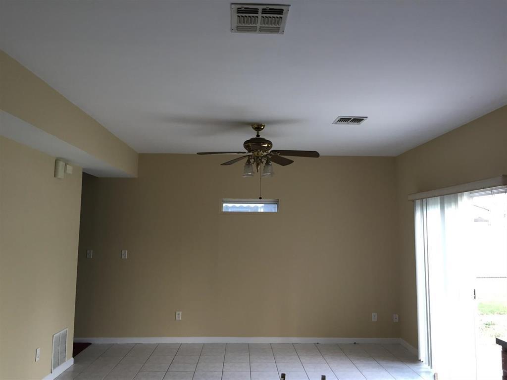 22 North Whittier Street, Unit B Carteret, NJ 07008 - Photo 10 of 27 a man sitting on a bench in a room