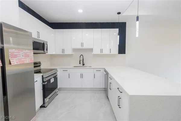 $1,699 | 843 Duplex Street East, Unit B, Lehigh Acres, FL 33974