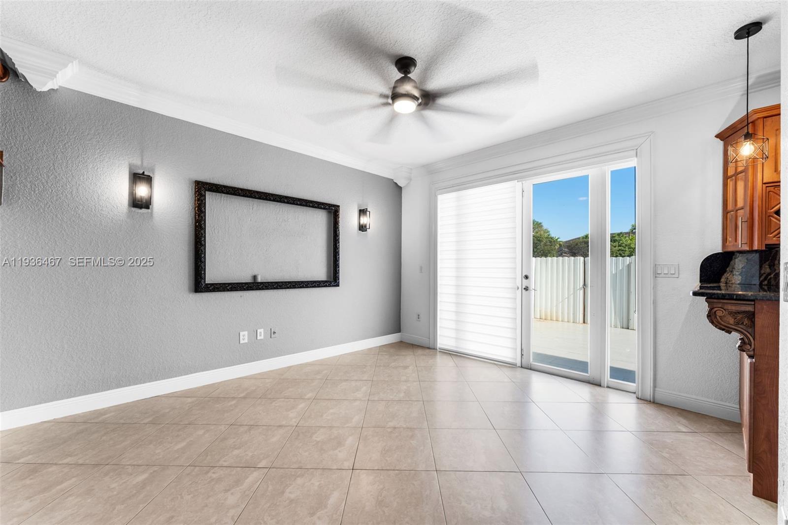 851 Southwest 154th Path, Unit 851 Miami, FL 33194 - Photo 19 of 45 a view of an empty room with a window