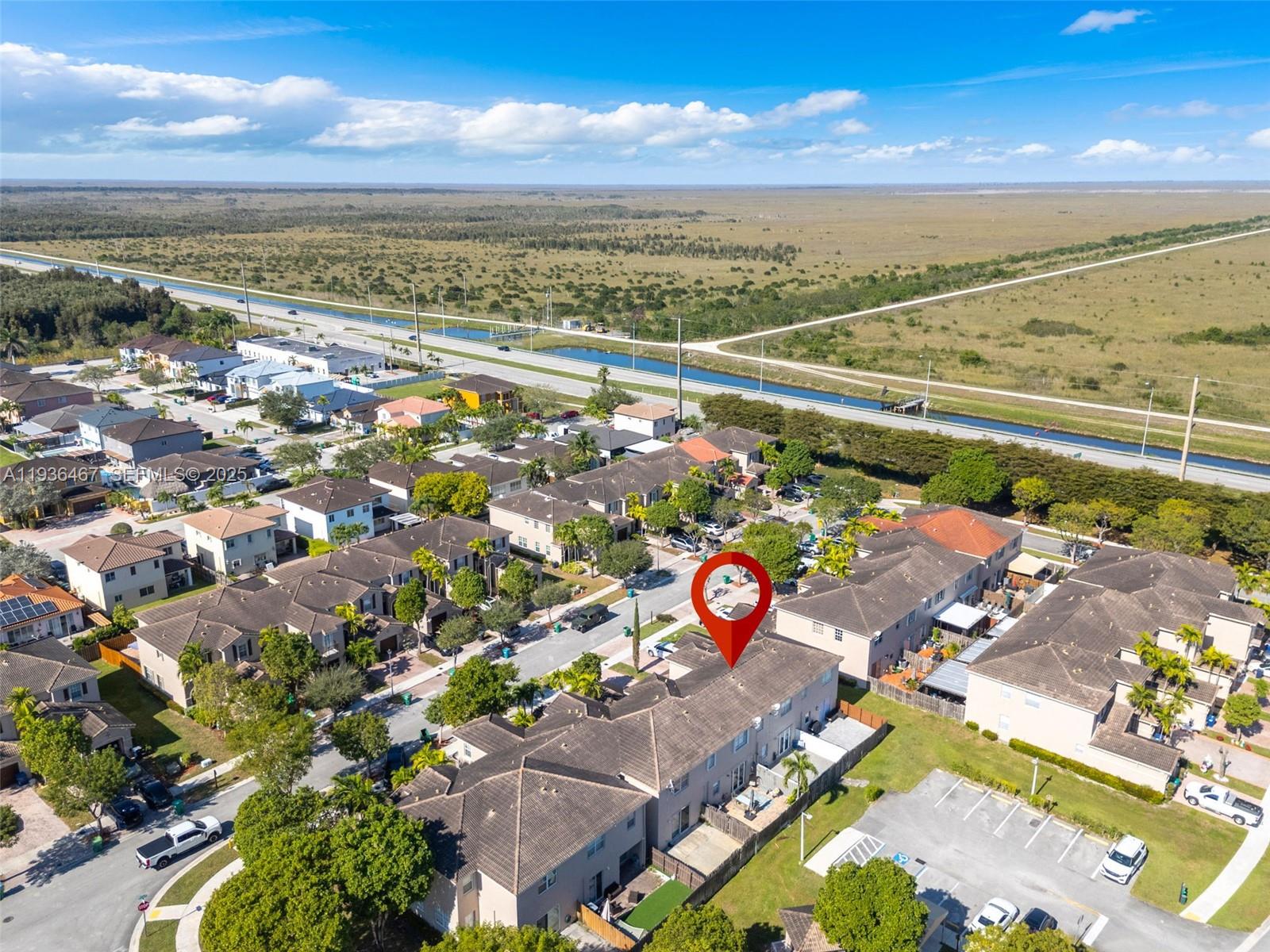 851 Southwest 154th Path, Unit 851 Miami, FL 33194 - Photo 26 of 45 an aerial view of a city