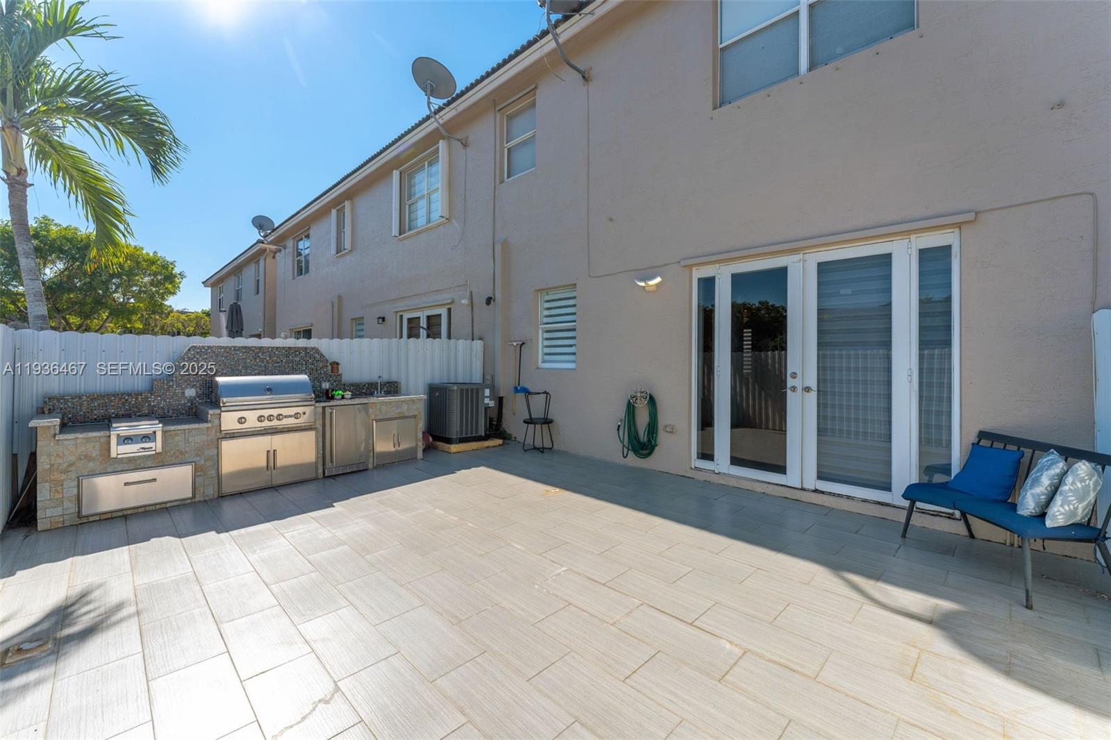 851 Southwest 154th Path, Unit 851 Miami, FL 33194 - Photo 31 of 45 a view of a kitchen with furniture and a kitchen