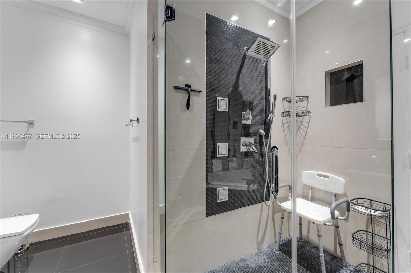 851 Southwest 154th Path, Unit 851 Miami, FL 33194 - Photo 5 of 45 a bathroom with a toilet and a shower