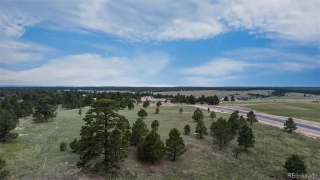 a view of a lake with a city