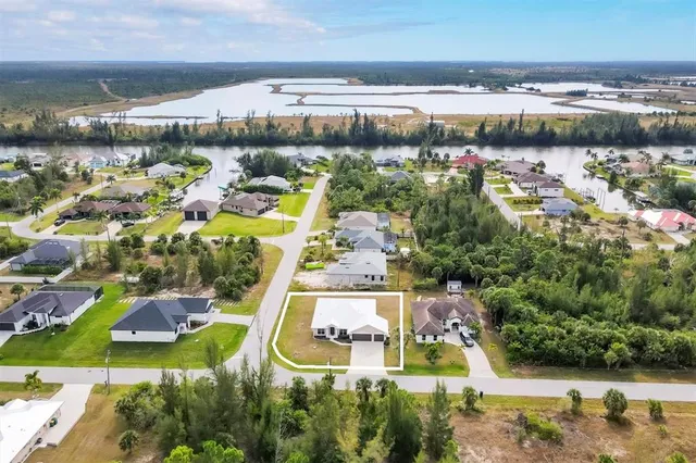 a kitchen with refrigerator and cabinets