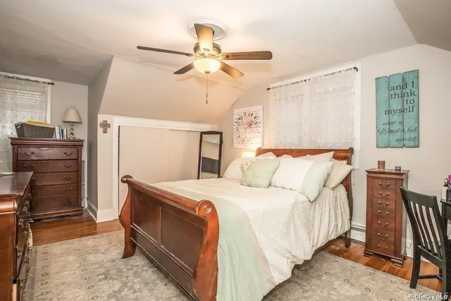 a bedroom with a bed and furniture