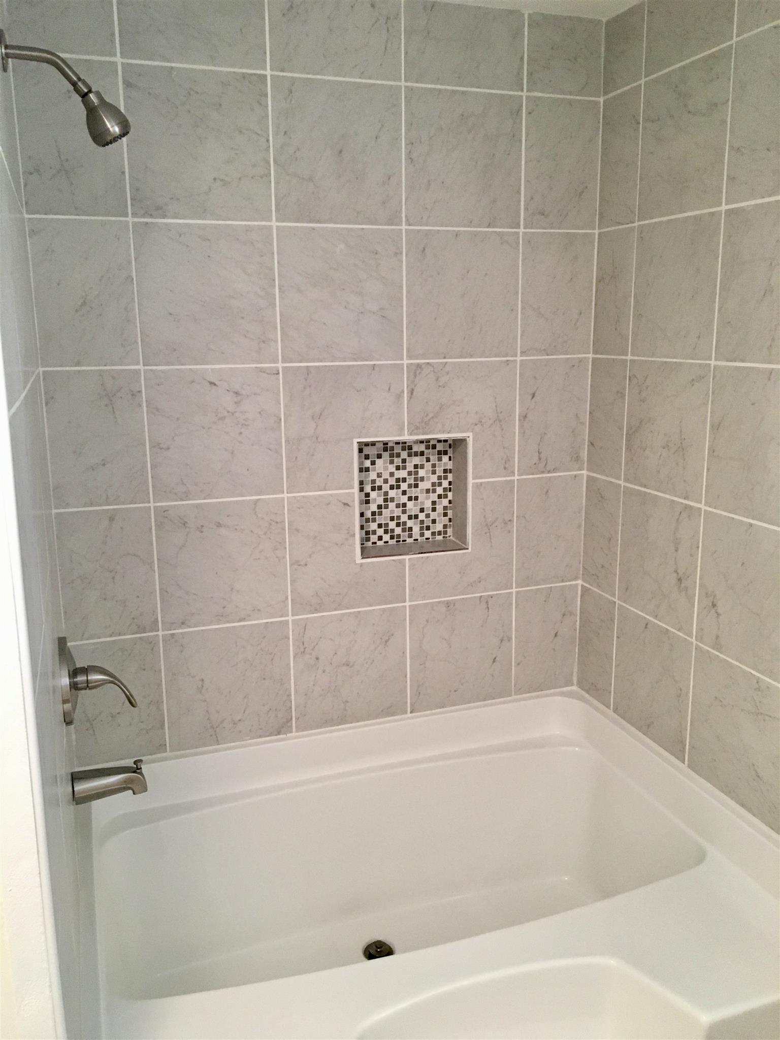 4302 Woodrow Wilson Road Springfield, TN 37172 - Photo 17 of 28 a bathroom with a bathtub