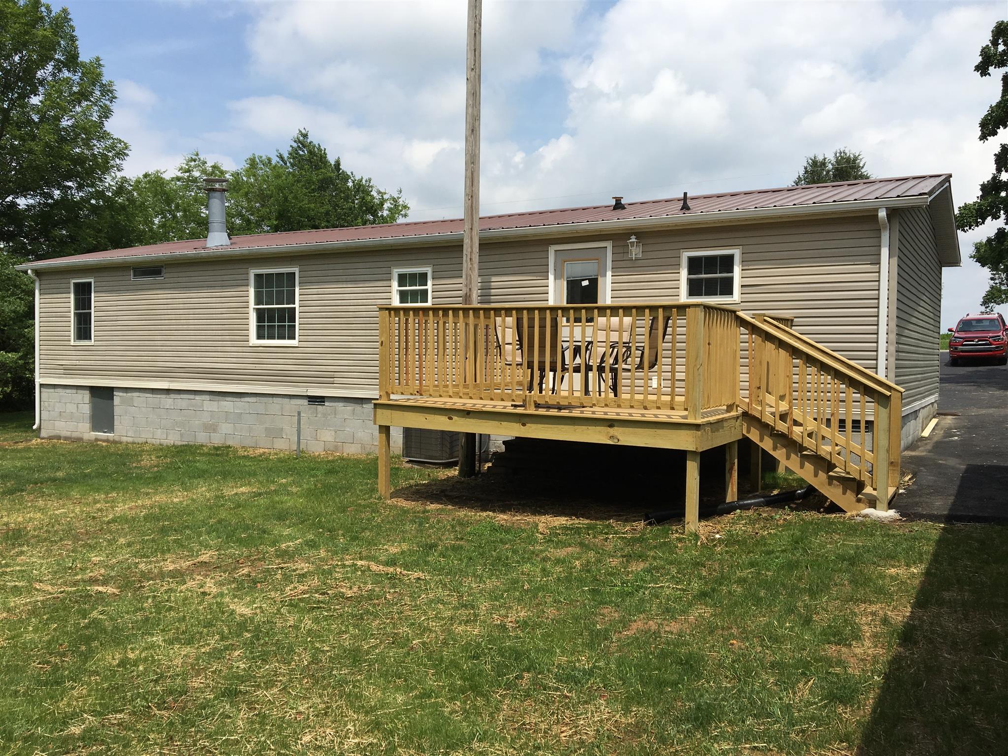 4302 Woodrow Wilson Road Springfield, TN 37172 - Photo 24 of 28 a front view of a house with a yard