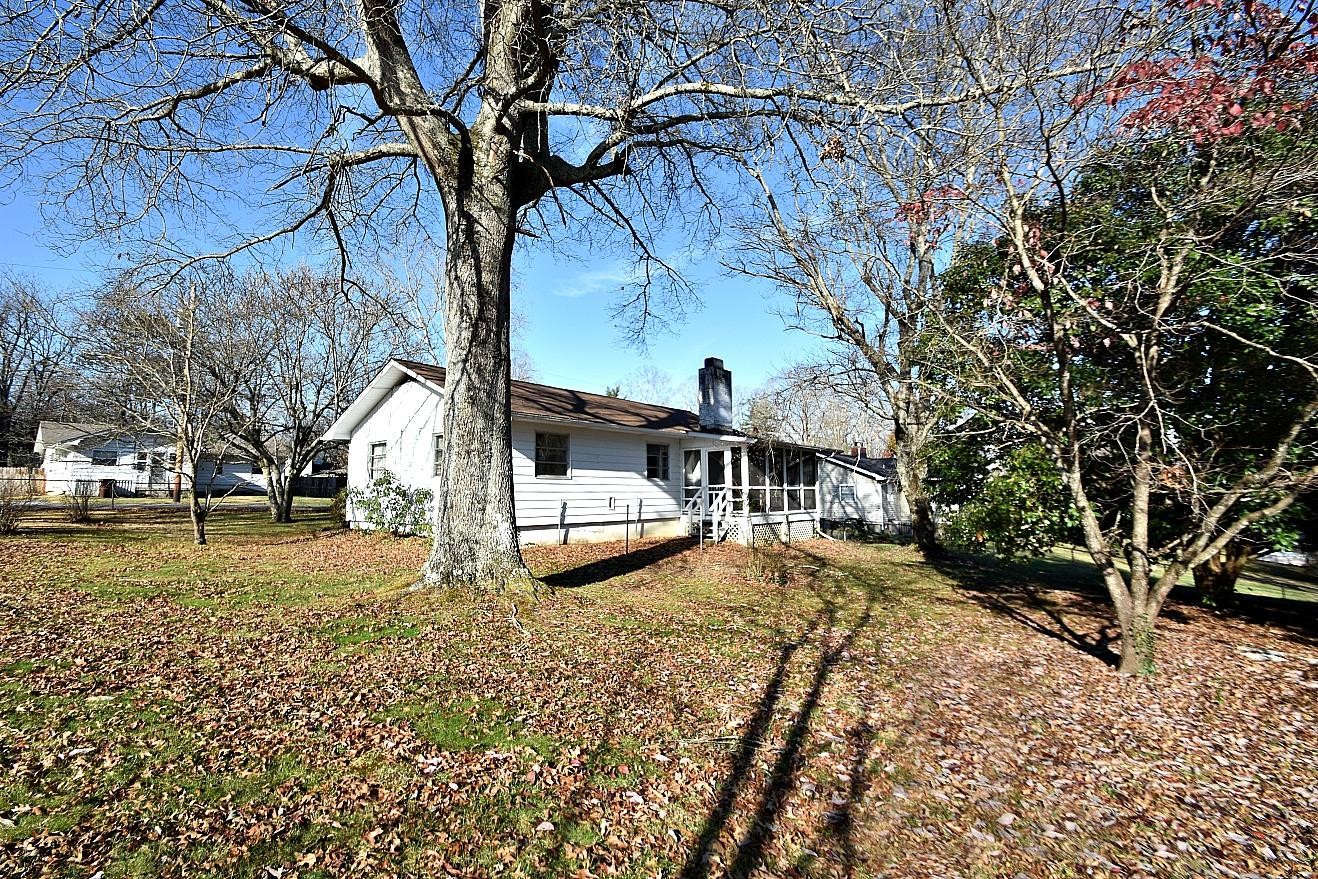 100 Orange Lane Oak Ridge, TN 37830 - Photo 17 of 19 a view of street with large trees