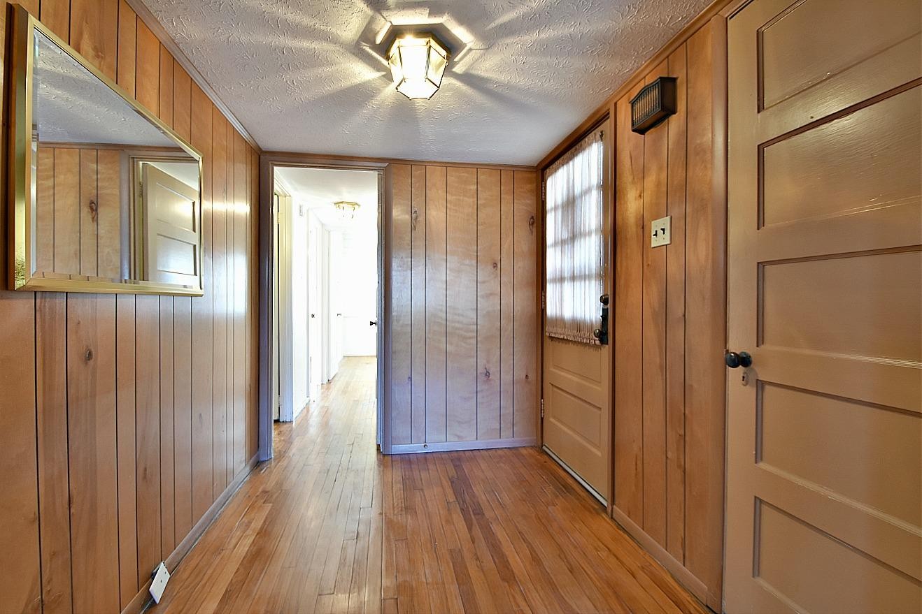 100 Orange Lane Oak Ridge, TN 37830 - Photo 3 of 19 a view of gallery with wooden floor