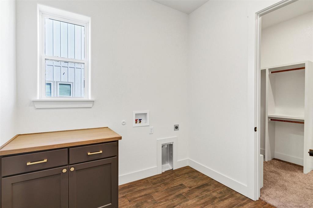 2105 Rattler Way Tolar, TX 76476 - Photo 17 of 30 a room with storage and utility