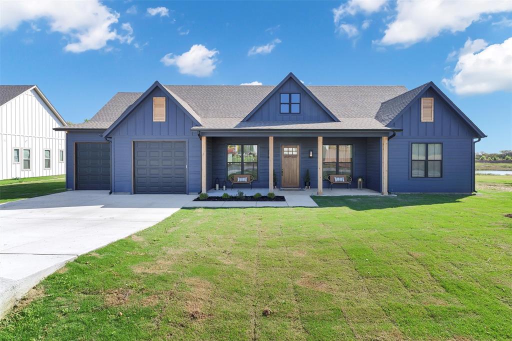 2105 Rattler Way Tolar, TX 76476 - Photo 2 of 30 a front view of a house with yard