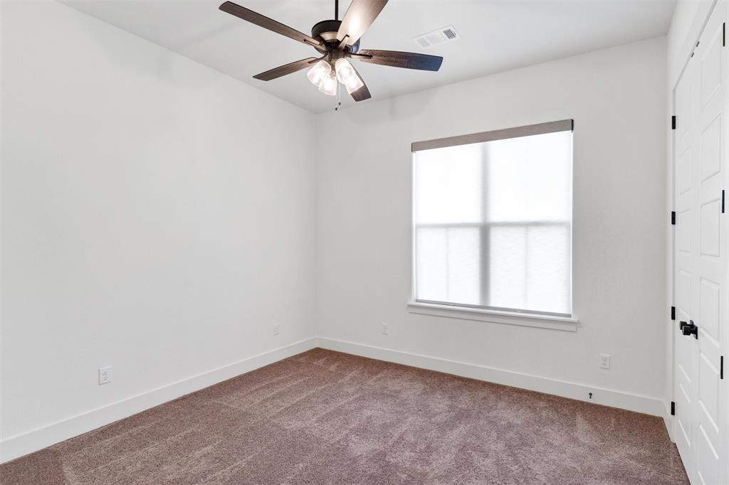 2105 Rattler Way Tolar, TX 76476 - Photo 26 of 30 an empty room with a window and a fan
