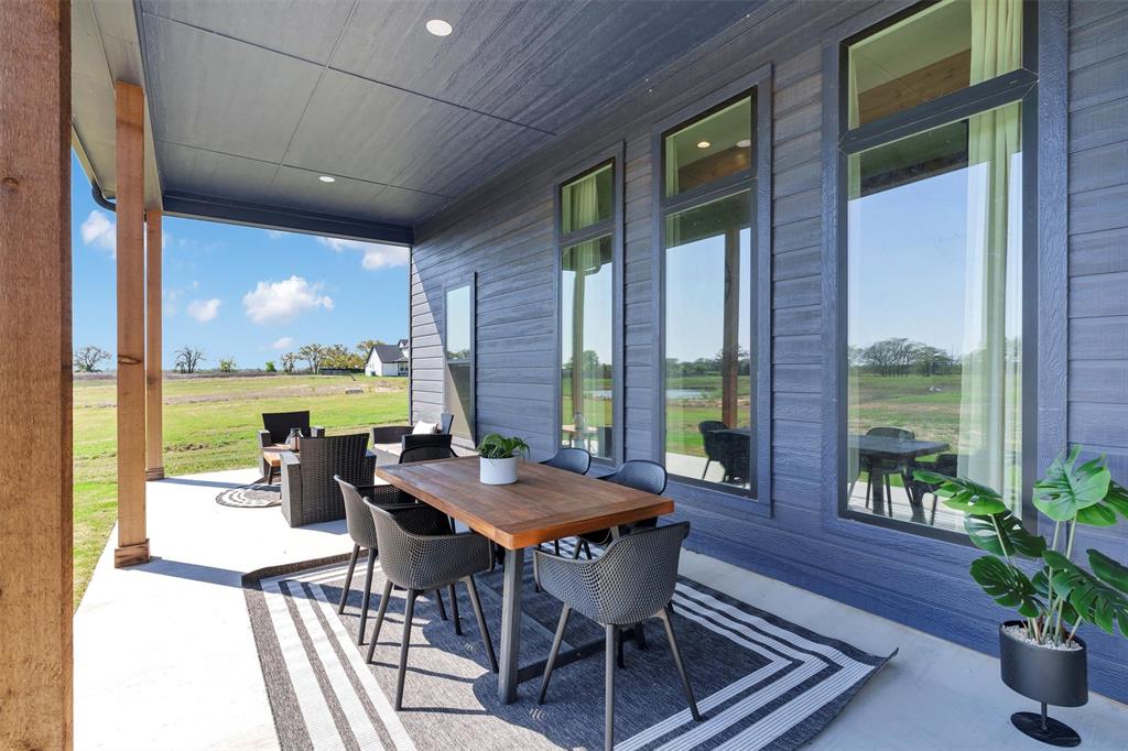 2105 Rattler Way Tolar, TX 76476 - Photo 29 of 30 a view of a dining room with furniture window and outside view