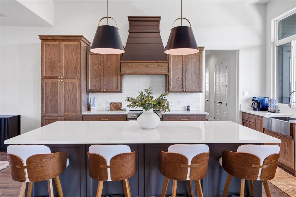 2105 Rattler Way Tolar, TX 76476 - Photo 9 of 30 a view of a dining room with furniture and wooden floor