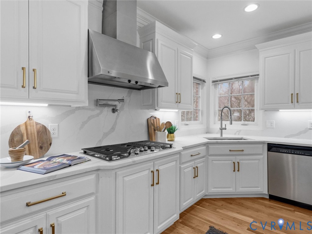 14335 Lander Road Midlothian, VA 23113 - Photo 17 of 70 a kitchen with stainless steel appliances a sink stove and cabinets