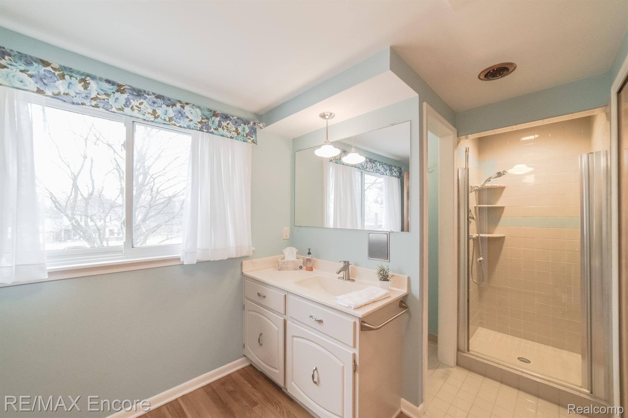 948 Spartan Court Rochester, MI 48309 - Photo 34 of 41 Large window provides tons of natural light and tiled shower