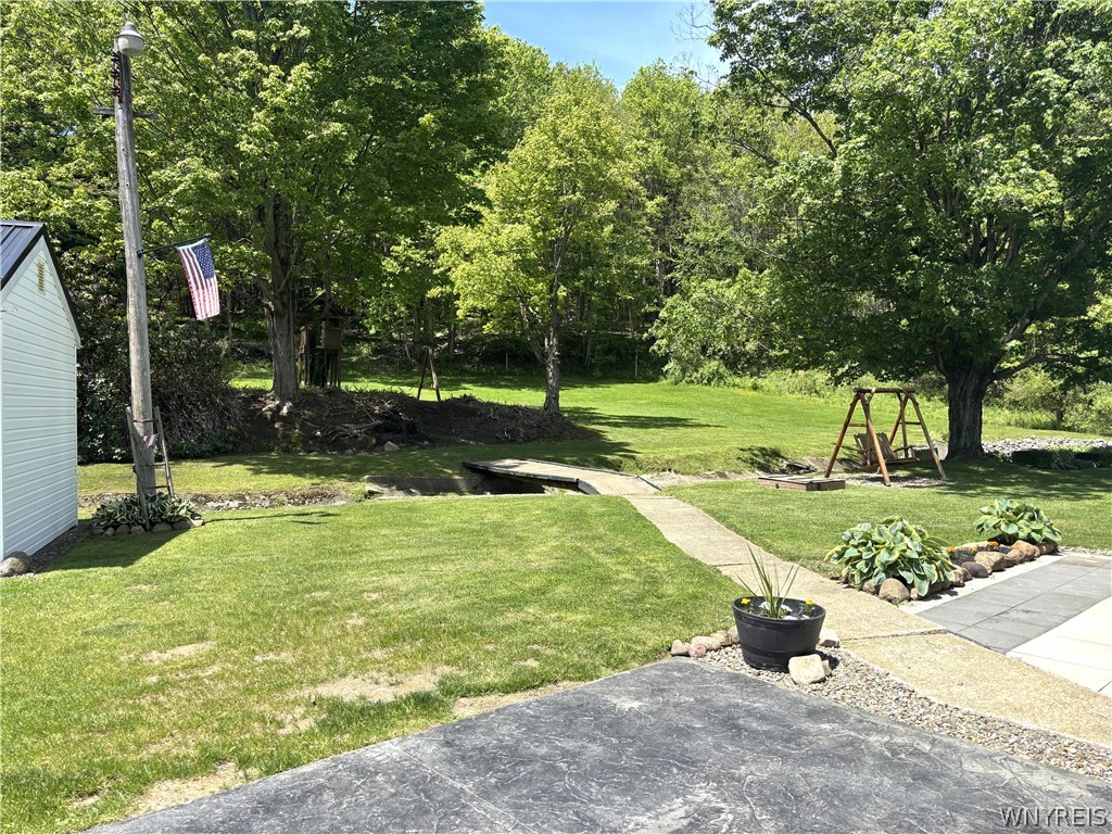 11806 Wyandale Road Concord, NY 14141 - Photo 5 of 34 Backyard view across the stream . Beautifully land