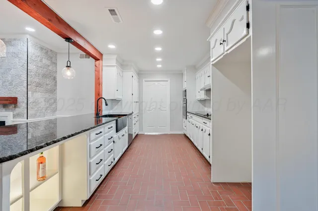 a hallway with cabinets