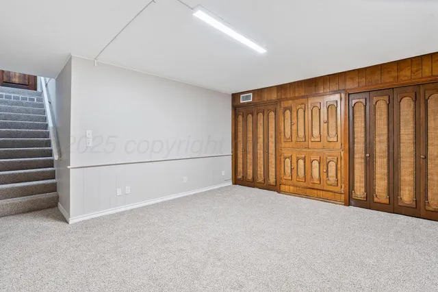 a view of a hallway with closet