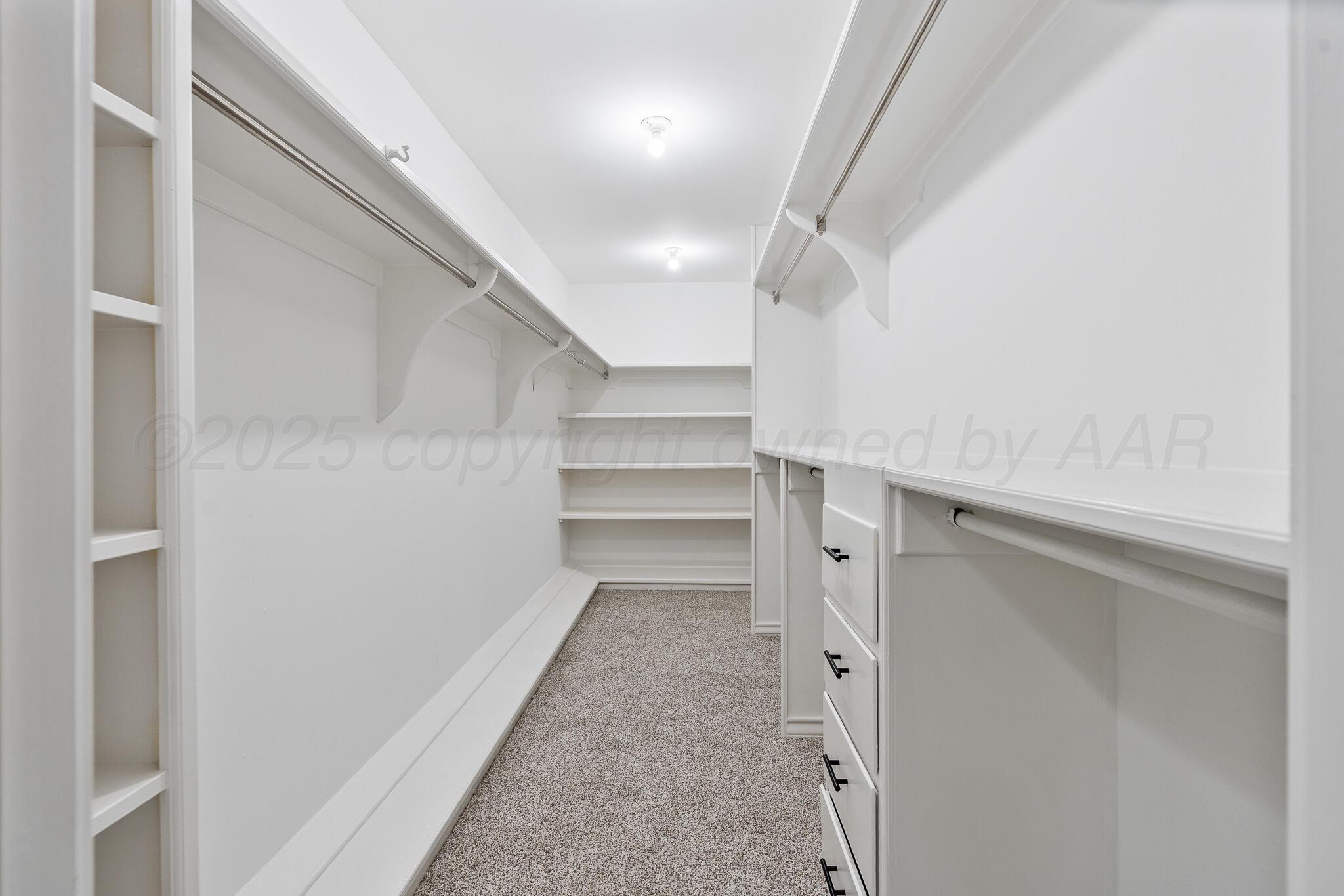 207 Yucca Terrace Plainview, TX 79072 - Photo 27 of 50 a view of a hallway with closet