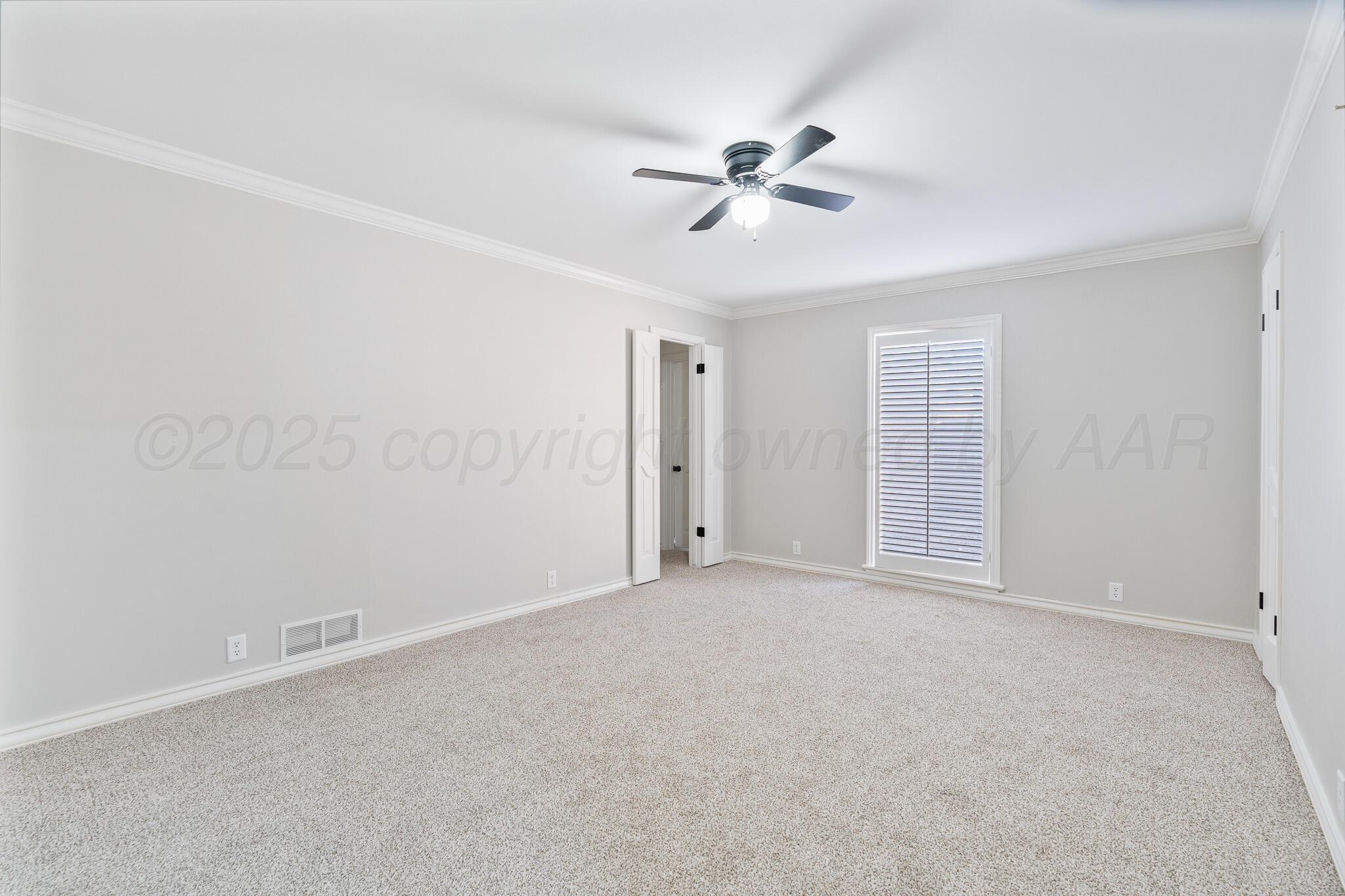 207 Yucca Terrace Plainview, TX 79072 - Photo 30 of 50 a view of an empty room with a window