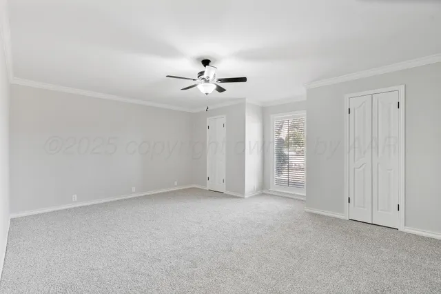 a view of cabinets and wooden floor