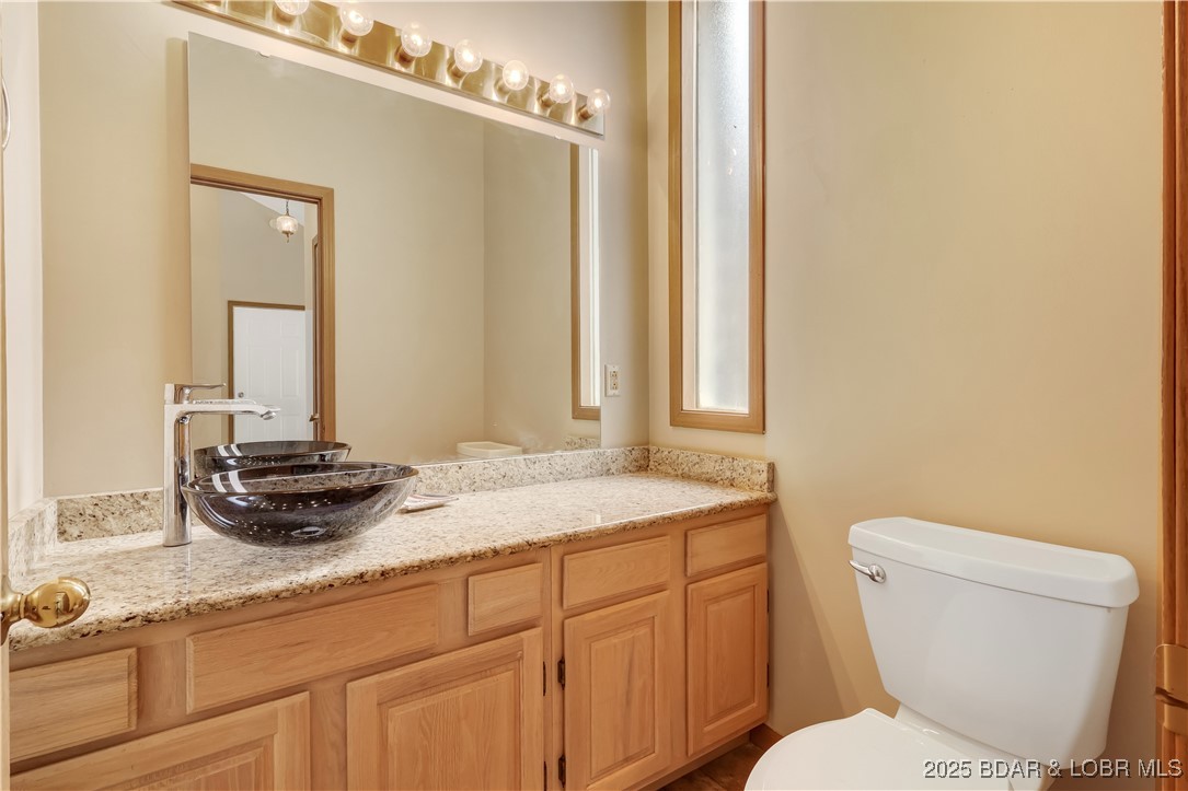 603 Niangua Shores Road Camdenton, MO 65020 - Photo 17 of 43 Half bath for walk in level living.