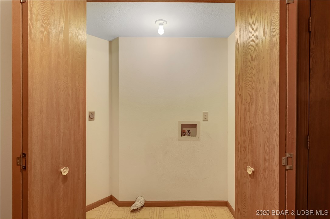 603 Niangua Shores Road Camdenton, MO 65020 - Photo 18 of 43 Laundry room right outside the master and all the