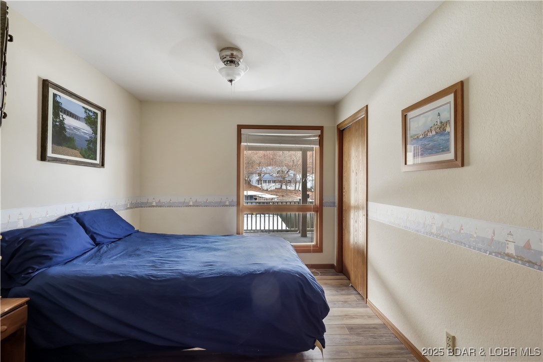 603 Niangua Shores Road Camdenton, MO 65020 - Photo 23 of 43 Middle bedroom on 2nd level.