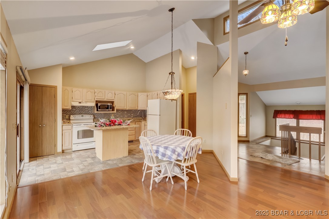 603 Niangua Shores Road Camdenton, MO 65020 - Photo 10 of 43 Diningarea to kitchen with granite counters and is