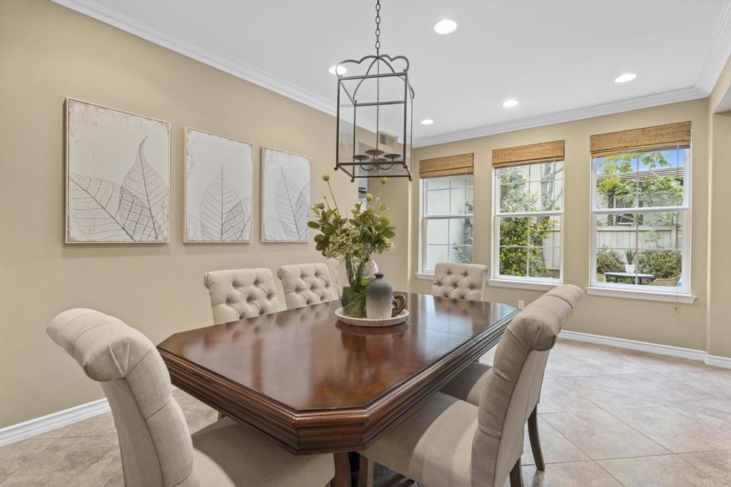 8021 Paseo Arrayan Carlsbad, CA 92009 - Photo 14 of 68 a dining room with furniture and window