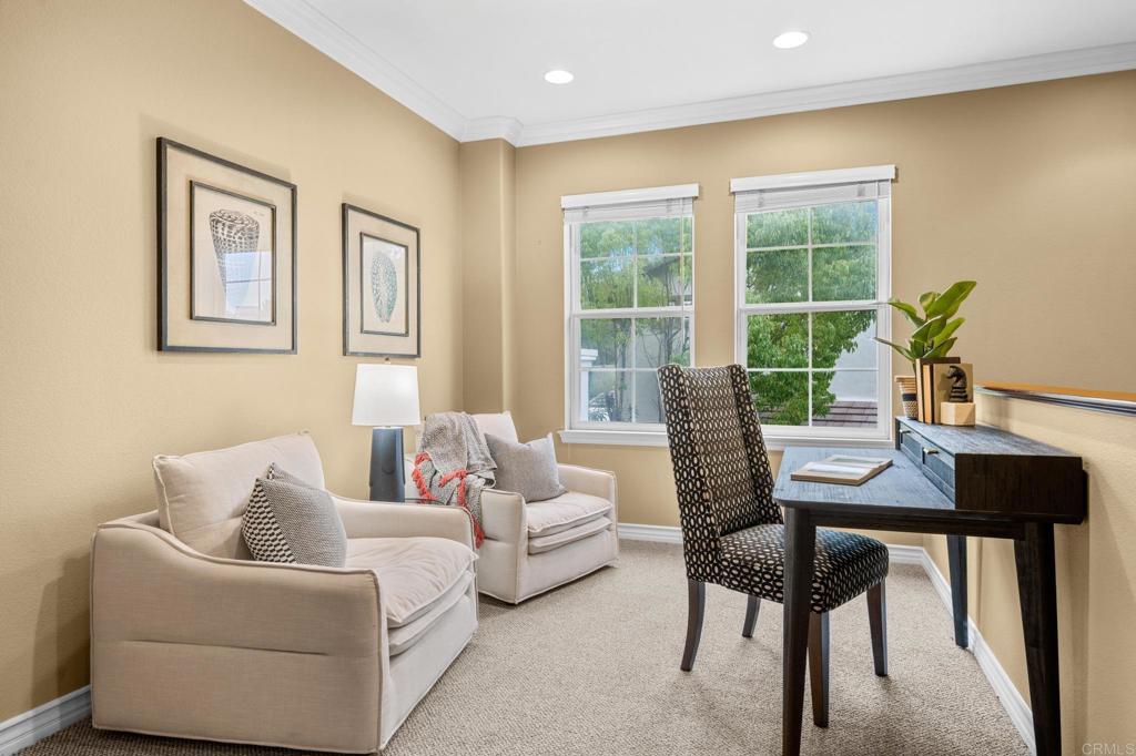 8021 Paseo Arrayan Carlsbad, CA 92009 - Photo 34 of 68 a living room with furniture and a window