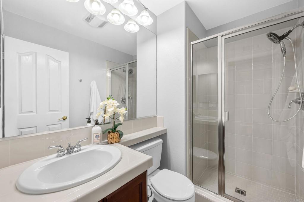 8021 Paseo Arrayan Carlsbad, CA 92009 - Photo 52 of 68 a bathroom with a sink toilet and shower
