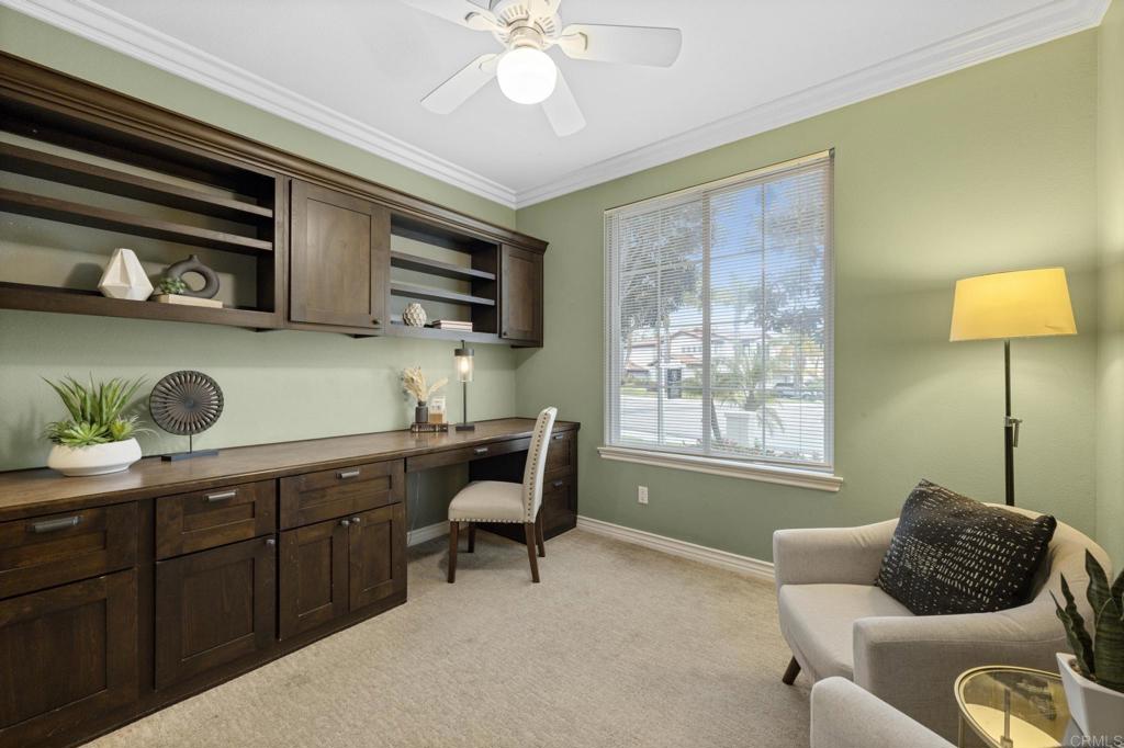 8021 Paseo Arrayan Carlsbad, CA 92009 - Photo 10 of 68 a living room with furniture and a window