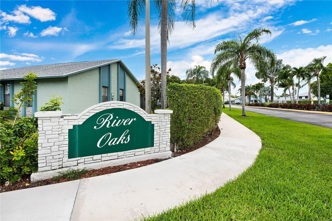 9085 Southwest 20th Street, Unit D Boca Raton, FL 33428 - Photo 24 of 25 a sign that is on the side of a building