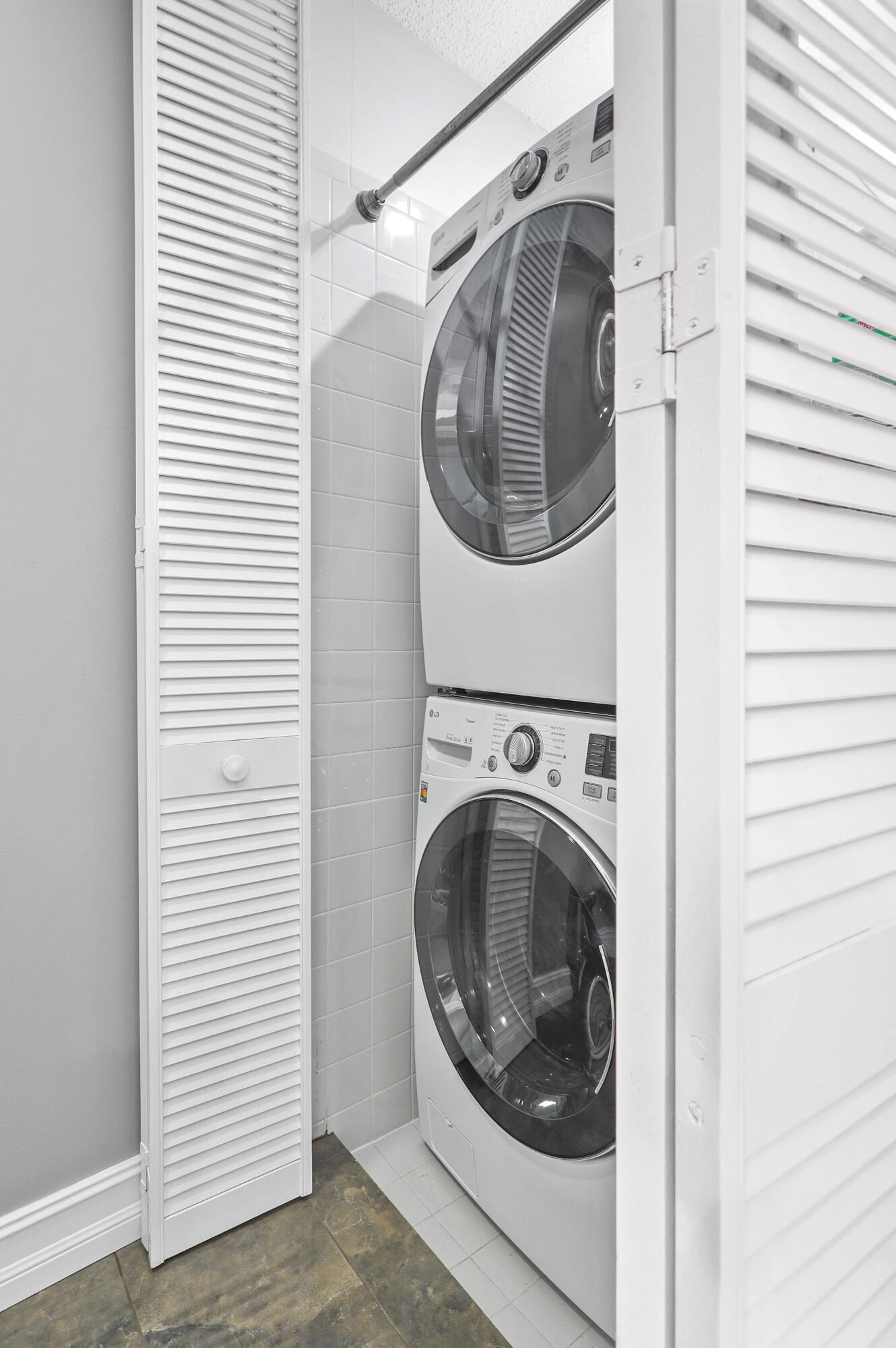 2056 Windward Way Jupiter, FL 33477 - Photo 19 of 58 a utility room with dryer and washer